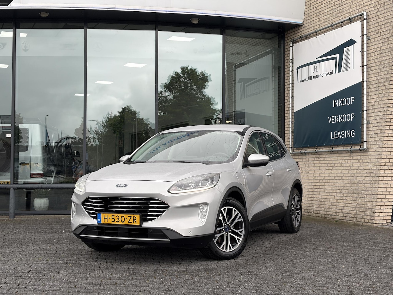 Ford Kuga - 2.5 PHEV Titanium*NAVI*CLIMA*HAAK*KEYLESS*CRUISE* - AutoWereld.nl