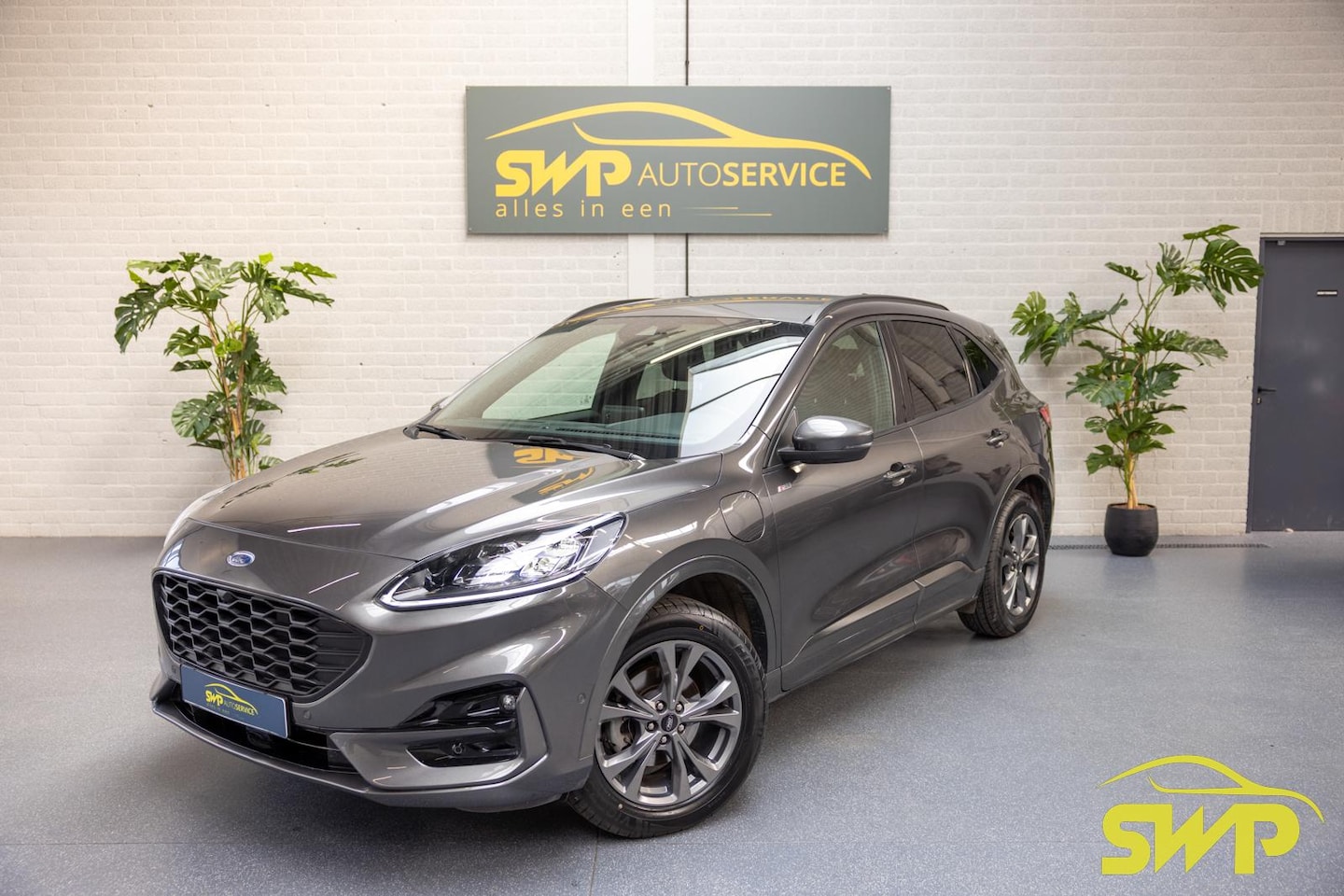 Ford Kuga - 2.5 PHEV ST-Line X | Elektr stoelen | Half-leer | Adaptieve cruise | B&O - AutoWereld.nl