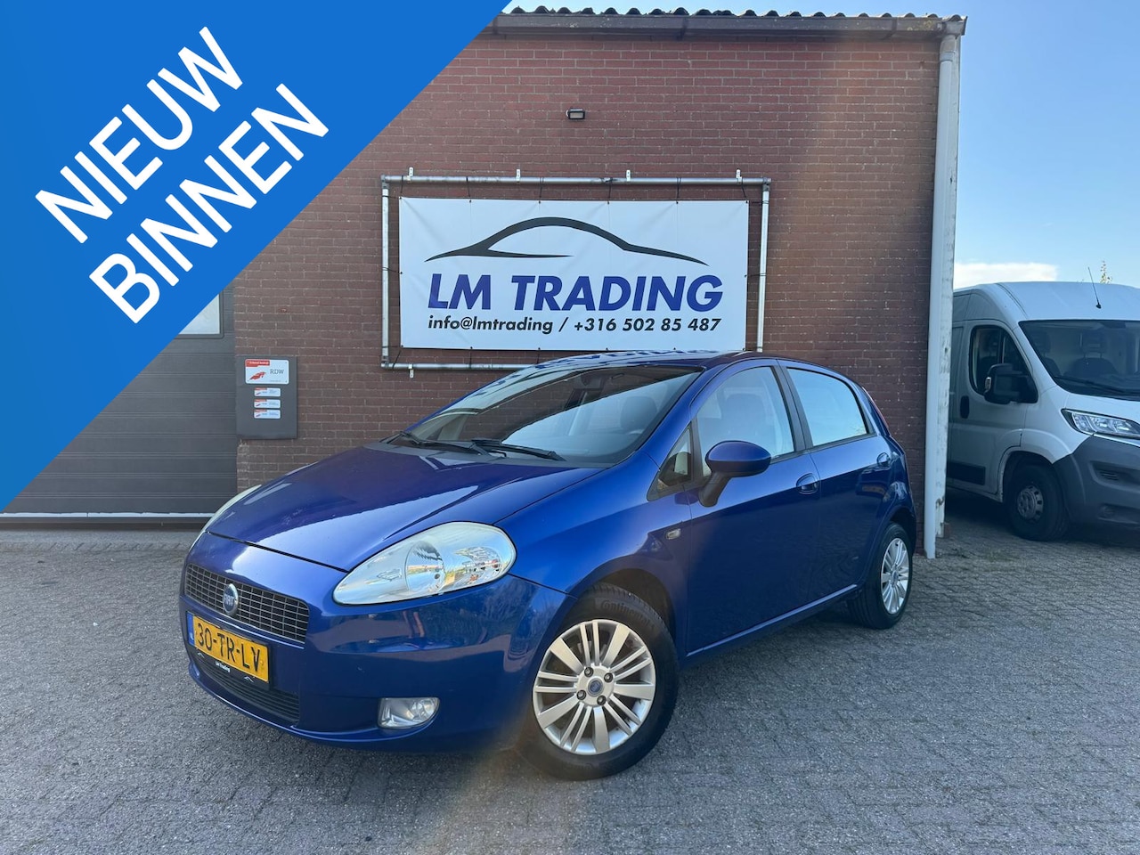 Fiat Grande Punto - 1.4 Edizione Blue & Me NIEUWE APK 14-07-2027 AIRCO IJSKOUD! CRUISE 5-DEURS LMV NAP! - AutoWereld.nl