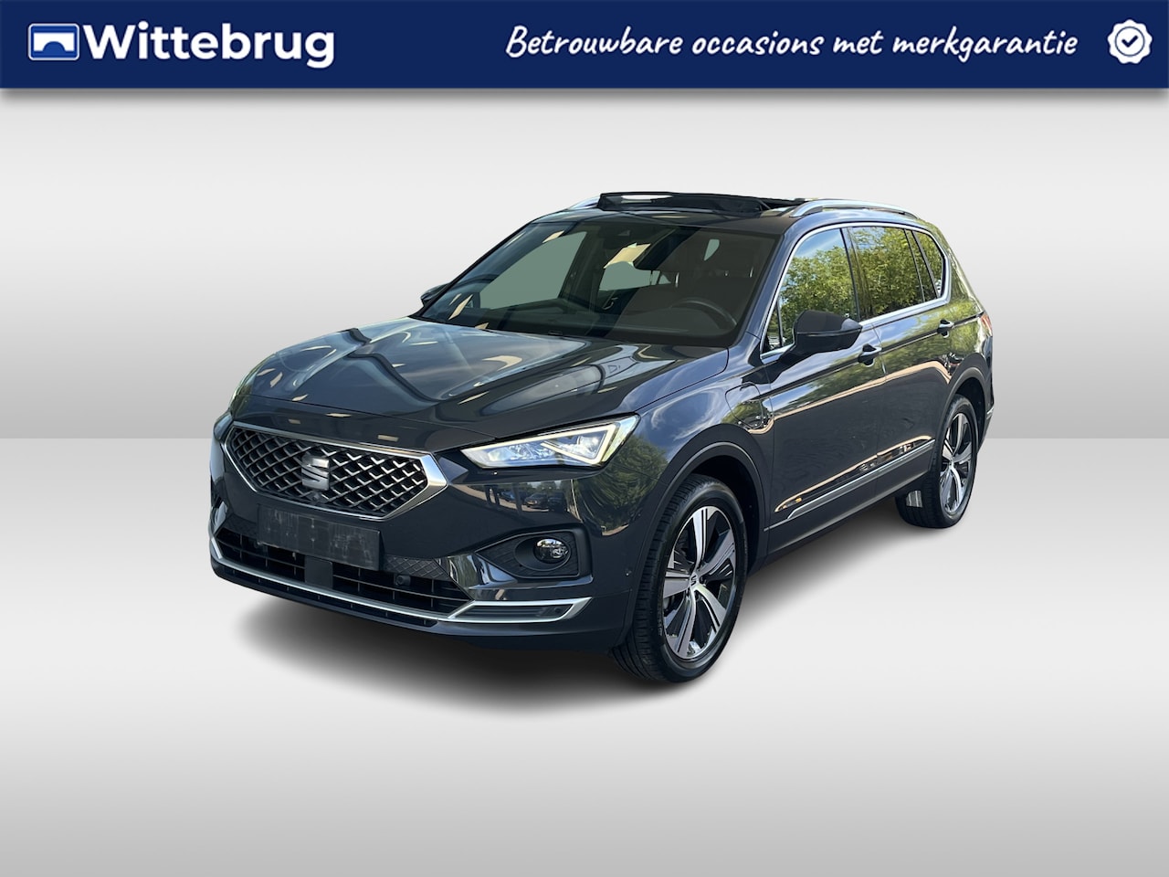 SEAT Tarraco - 1.4 TSI 245pk e-Hybrid PHEV Xperience DSG Automaat / Panorama dak / Wegkl Trekhaak / LEDER - AutoWereld.nl