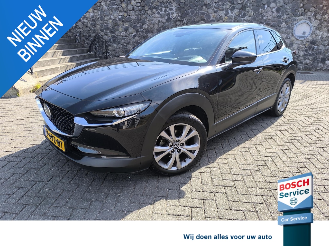 Mazda CX-30 - 2.0 e-SkyActiv-X M Hybrid Sportive stoel en stuur verwarming, carplay, electr A klep, head - AutoWereld.nl