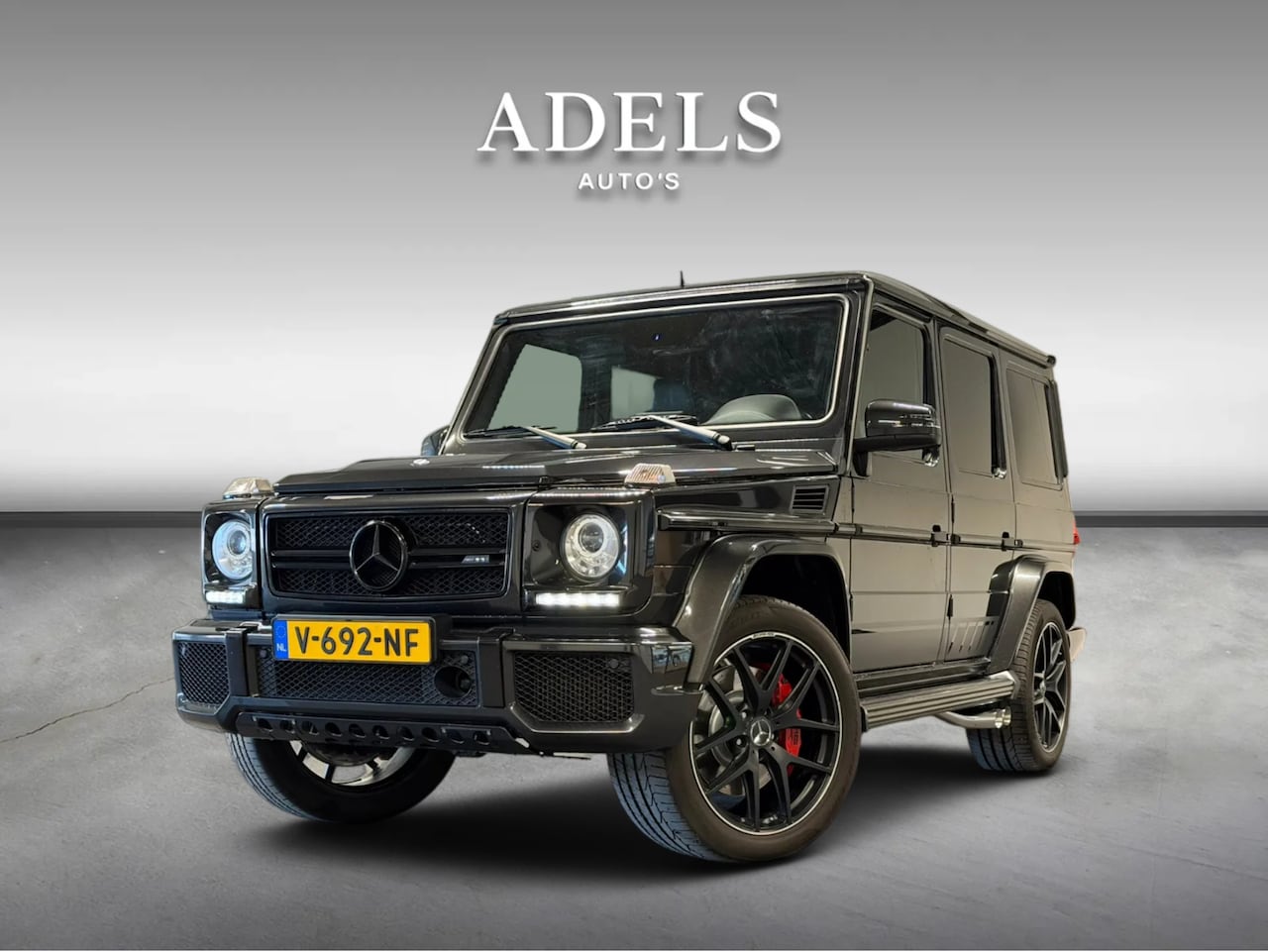 Mercedes-Benz G-klasse - AMG 63 AMG 463 Edition Brabus Uitlaat Grijskenteken Schuifdak Trekhaak ACC Designo Leder - AutoWereld.nl