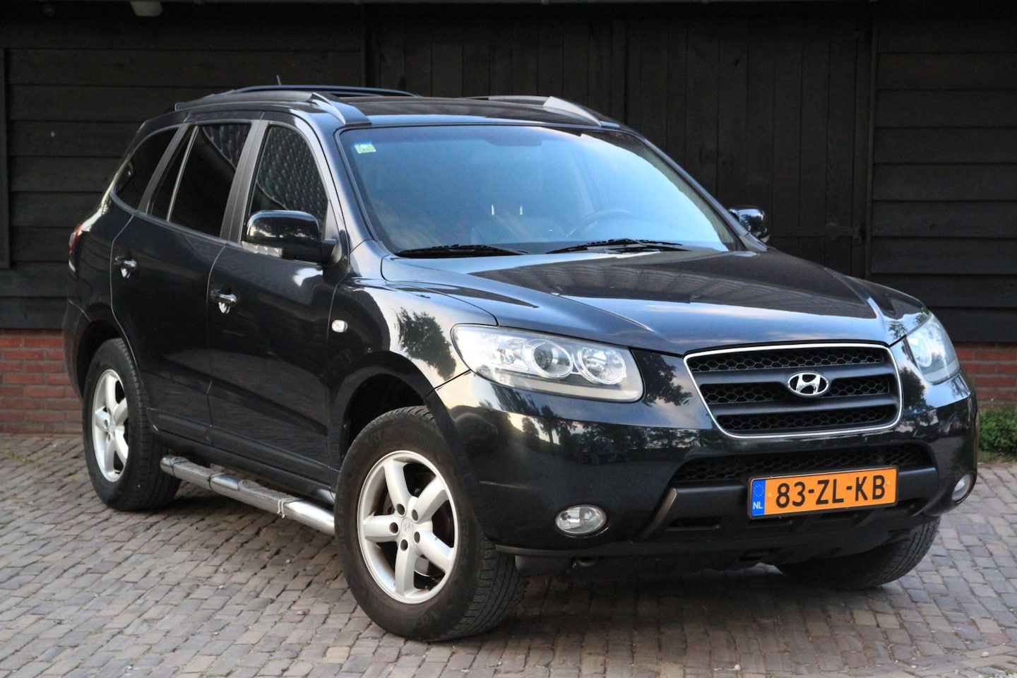 Hyundai Santa Fe - 2.7i V6 4WD Business Edition Elek-Dak/Camera/Parkeersensor/Leer - AutoWereld.nl
