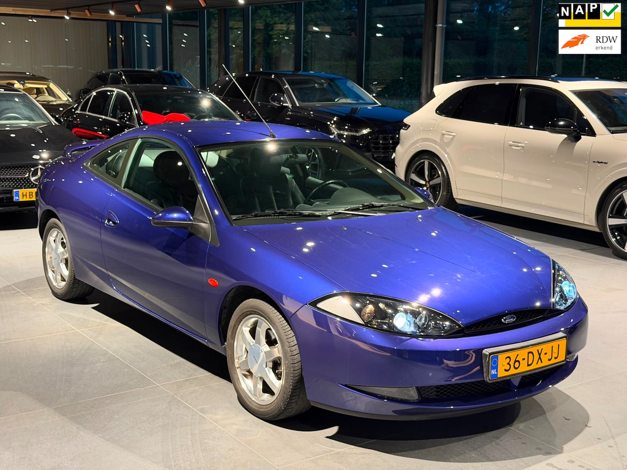 Ford Cougar - 2.5-24V V6 UNIEK EXEMPLAAR NIEUWSTAAT 1e eigr NAP - AutoWereld.nl
