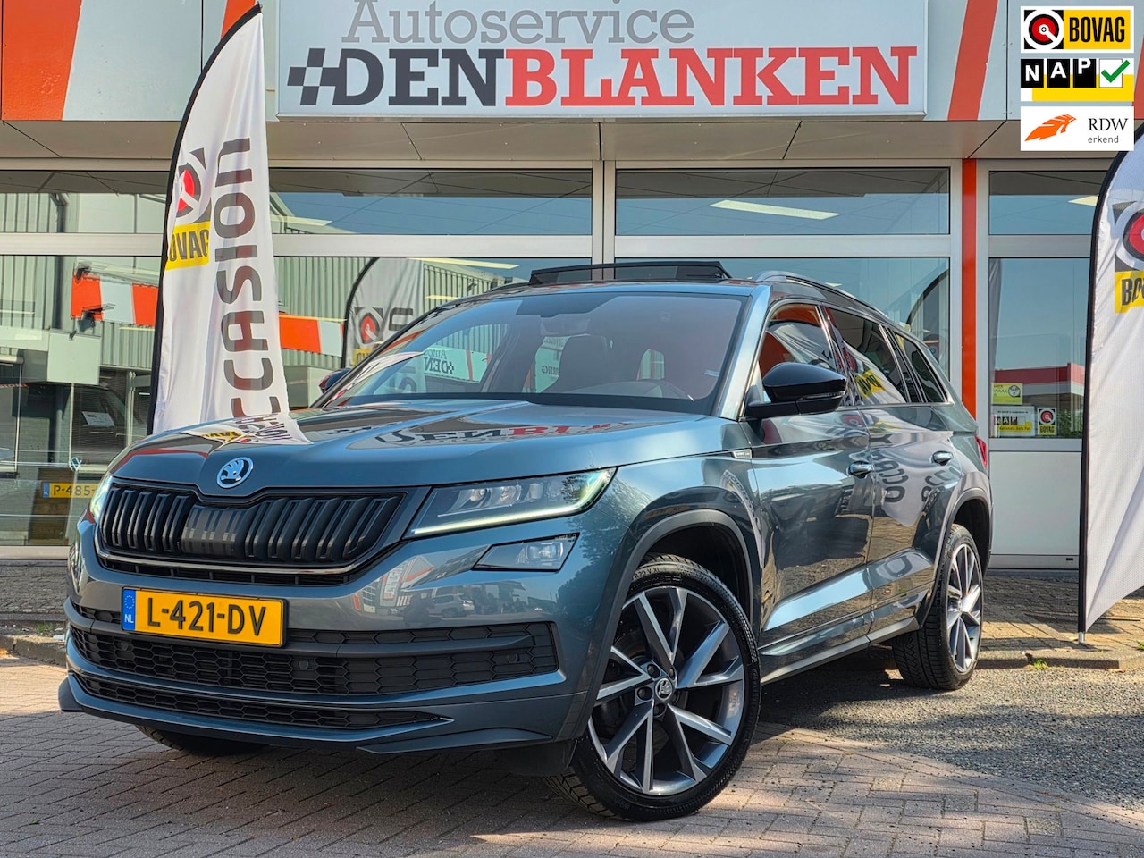 Skoda Kodiaq - 1.5 TSI Sportline Automaat BJ.2021/ Panodak / Half Leer / Keyless / Climate Control / Led - AutoWereld.nl