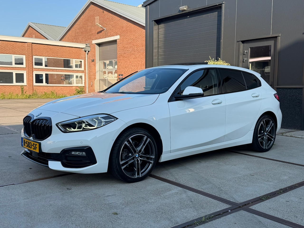 BMW 1-serie - 118i Auto Panoramadak SportLine Virtual NAP BTW - AutoWereld.nl