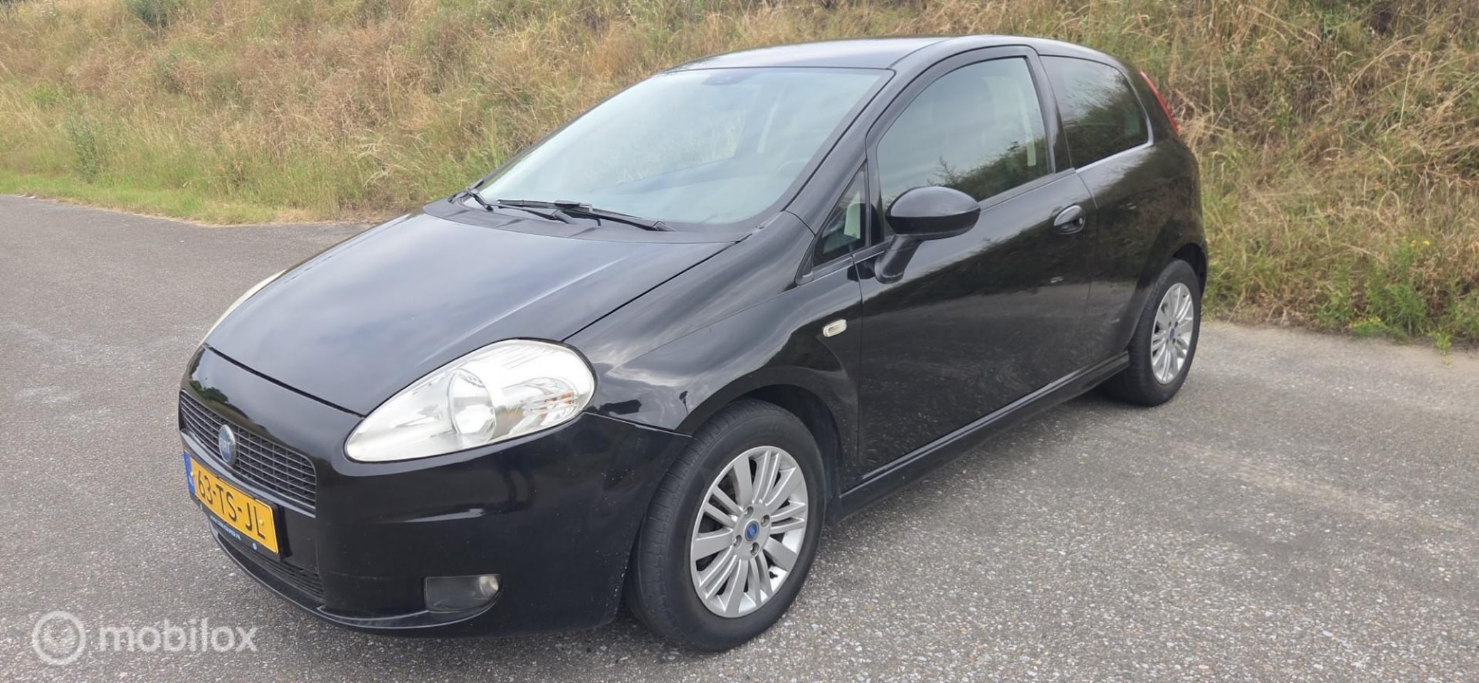 Fiat Grande Punto - 1.4-16V Dynamic 95pk/6 bak/audio/lm-velgen - AutoWereld.nl