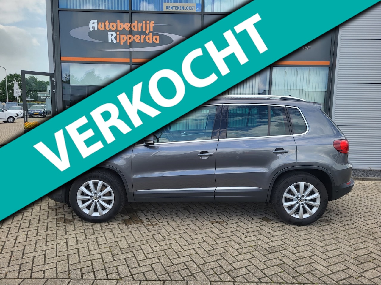 Volkswagen Tiguan - 1.4 TSI Sport&Style - AutoWereld.nl
