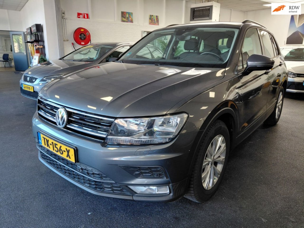 Volkswagen Tiguan - 1.4 TSI ACT | Wegklapbare trekhaak - AutoWereld.nl