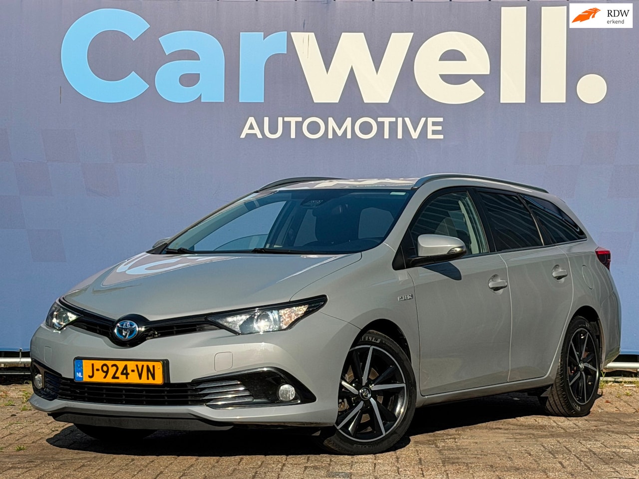 Toyota Auris Touring Sports - 1.8 Hybrid Dynamic|1e Eigenaar|Navi|Camera|Climate|Cruise|LMV|DealerOnderhouden|Apk tot 04 - AutoWereld.nl