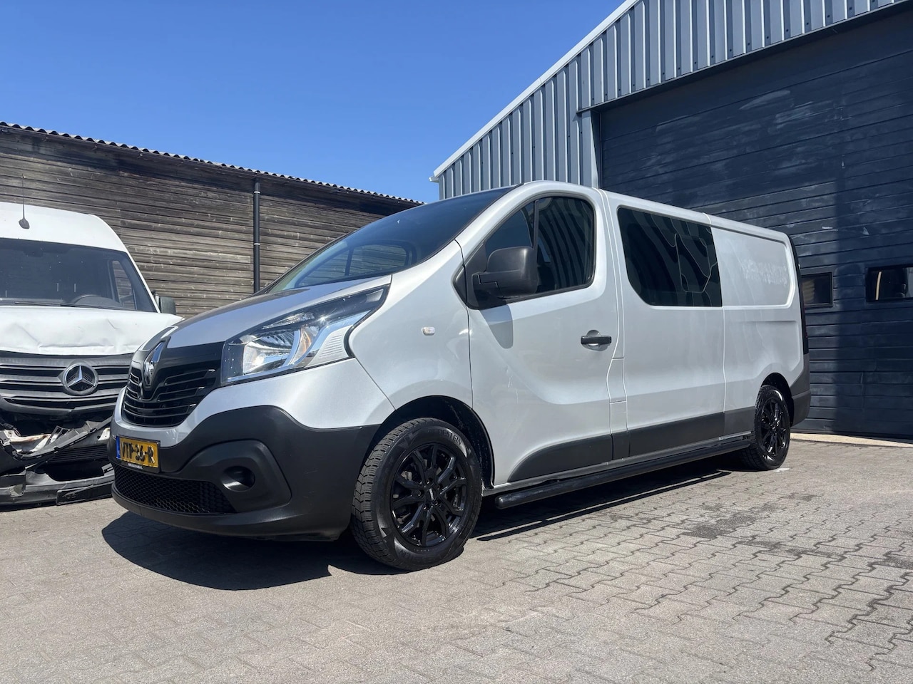 Renault Trafic - 1.6 dCi Dubbel Cabine Airco Navi Trekhaak - AutoWereld.nl
