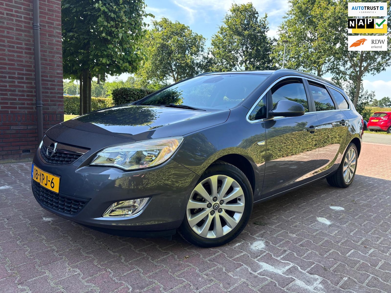 Opel Astra Sports Tourer - 1.4 Cosmo 1.4 Cosmo - AutoWereld.nl