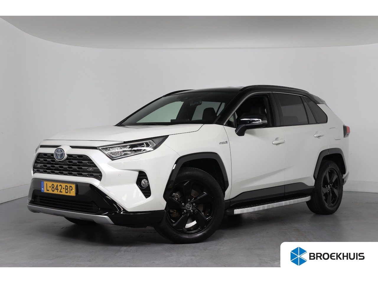 Toyota RAV4 - 2.5 Hybrid AWD Bi-Tone | Dealer Onderhouden! | Stoel/stuurverwarming | Navi | Clima | Came - AutoWereld.nl