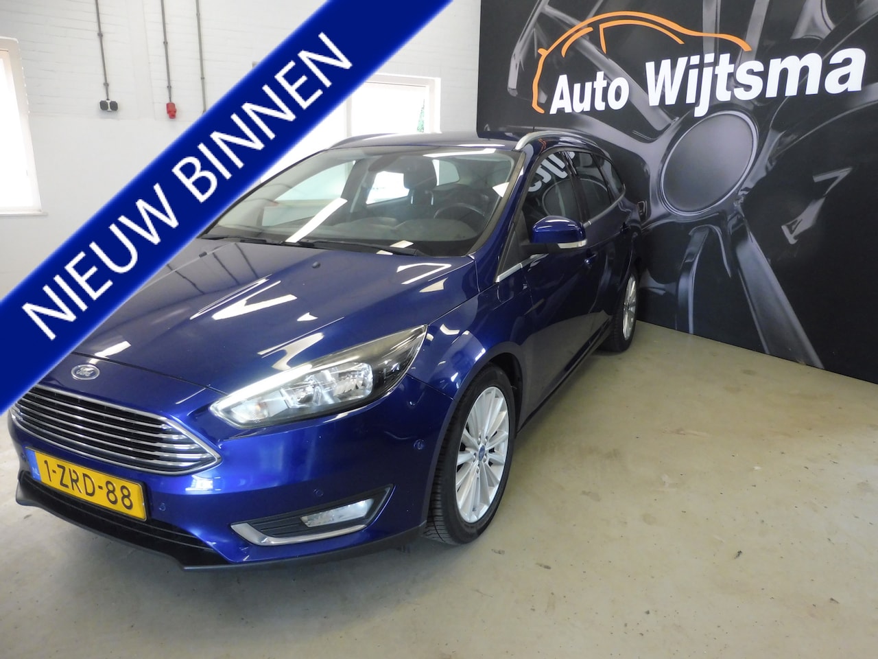 Ford Focus Wagon - 1.0 Titanium Trekhaak | Cruise | LMV | PDC | Verw voorr. | Navi - AutoWereld.nl