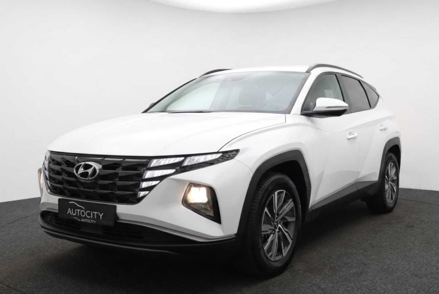 Hyundai Tucson - 1.6 T-GDI HEV Comfort 230PK Automaat | Carplay | Adaptive Cruise | Camera - AutoWereld.nl