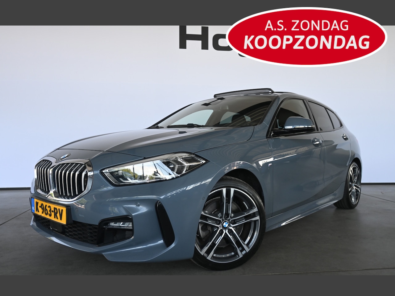 BMW 1-serie - 120i Automaat High Executive M-Pakket Navigatie Panoramdak Carplay LED Inruil Mogelijk! - AutoWereld.nl