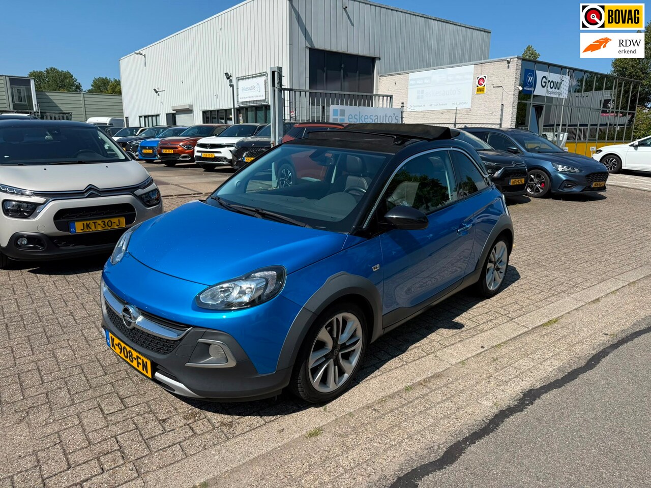 Opel ADAM - 1.0 Turbo Rocks 1.0 Turbo Rocks, Cabrio, Airco, Stoel/stuur verwarming, Half leder - AutoWereld.nl