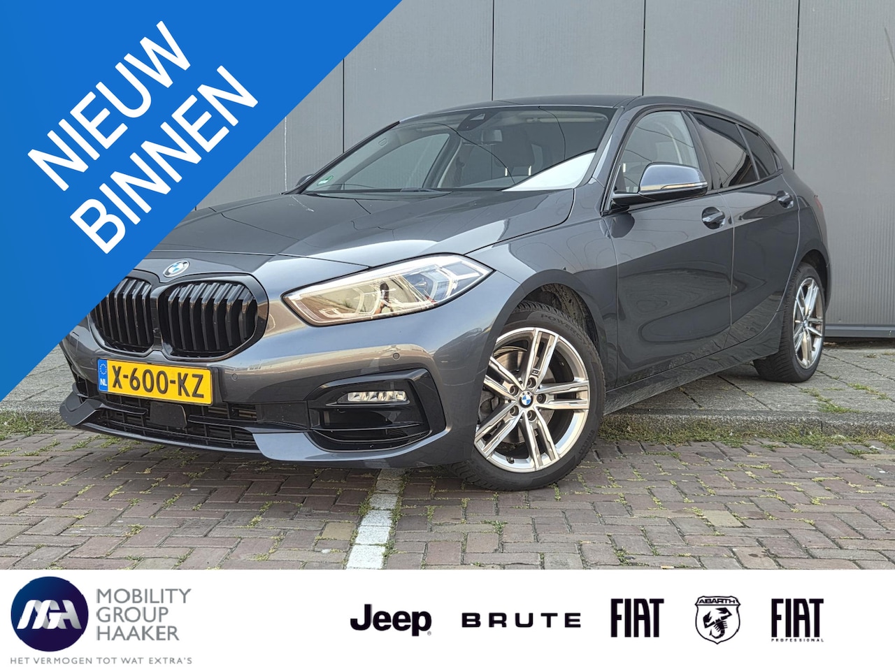 BMW 1-serie - 118i High Executive | Apple Carplay | Stoelverwarming | Navigatie - AutoWereld.nl