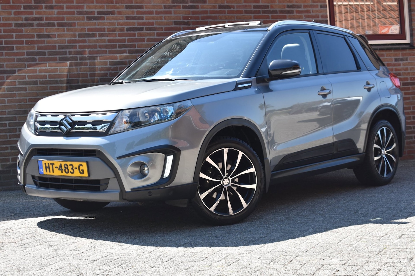 Suzuki Vitara - 1.6 High Executive Allgrip '16 Pano Navi Airco Inruil mogelijk - AutoWereld.nl
