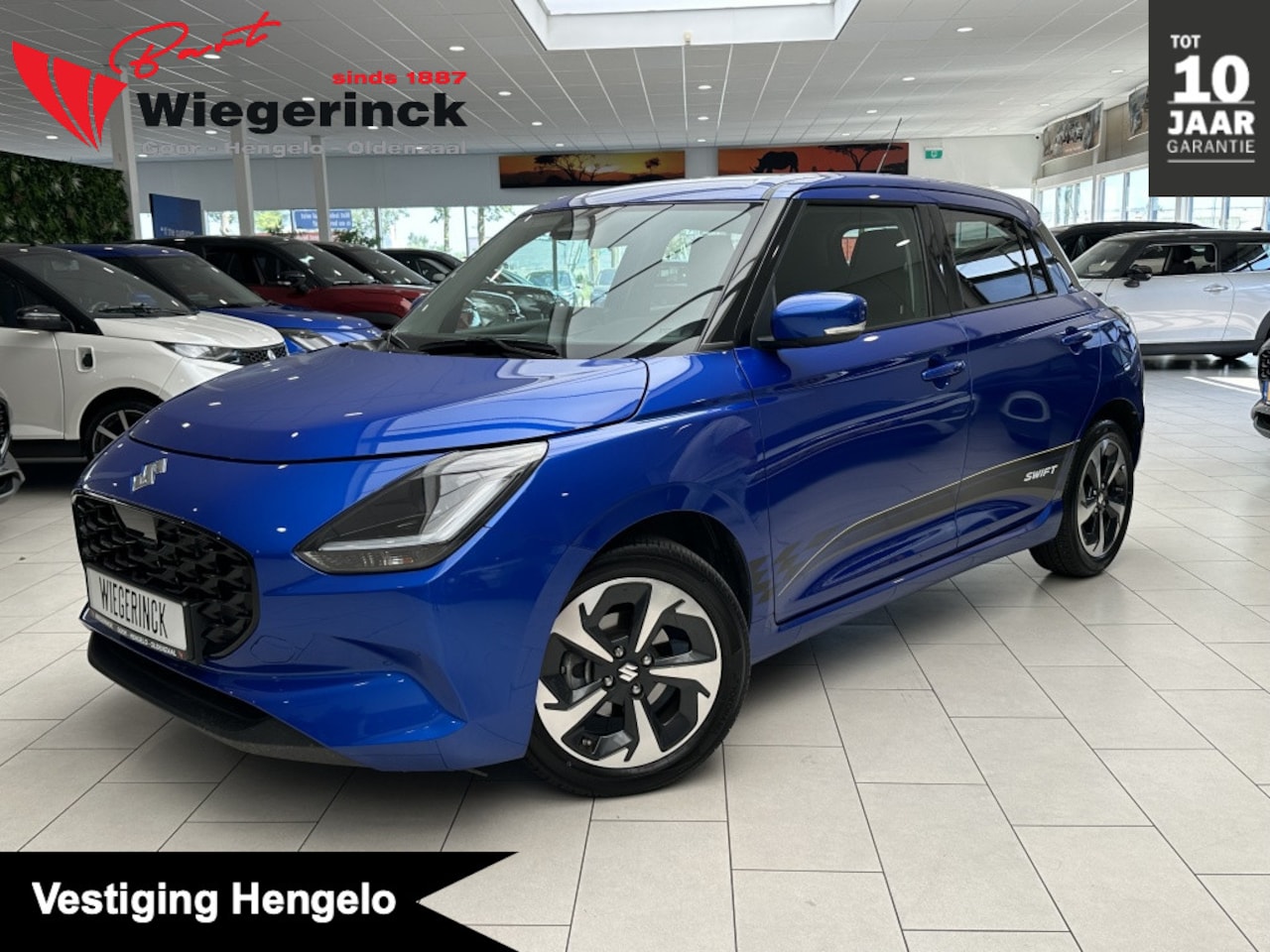 Suzuki Swift - 1.2 Select SmartHybride [ CARPLAY I CAMERA I DRAADLOZE TELEFOON OPLADER ] - AutoWereld.nl