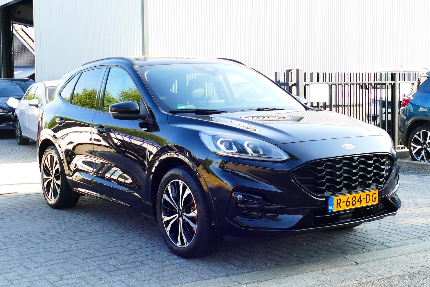 Ford Kuga - 2.5 PHEV ST-Line. Panodak, Adap Cruise, B&O, Stoel&StuurVerw, 19"LMV, Haak 1200kg - AutoWereld.nl