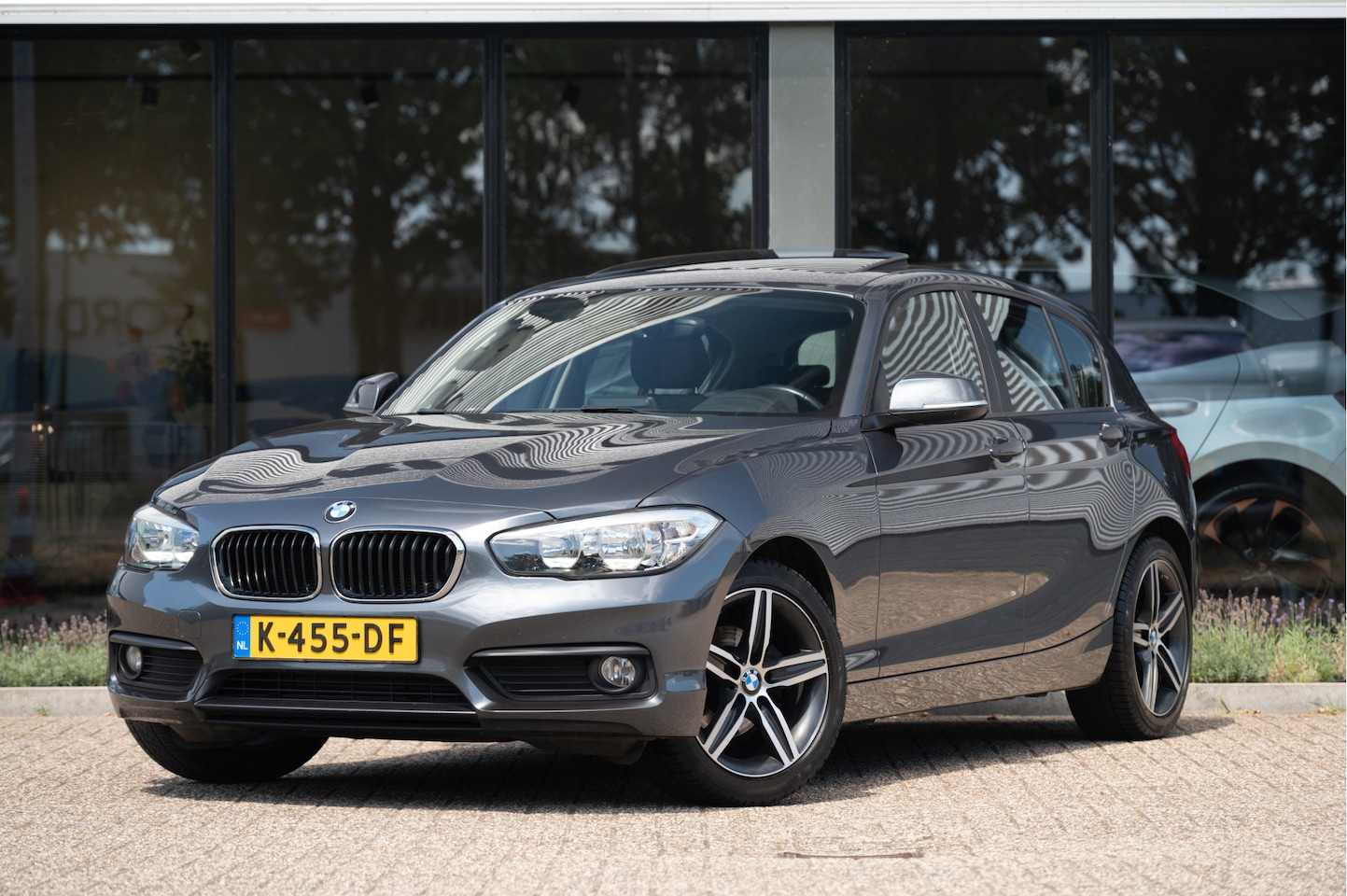 BMW 1-serie - 118i | Schuif/Kanteldak | Navi | Trekhaak | Stoelverw. | PDC | Clima | Cruise - AutoWereld.nl