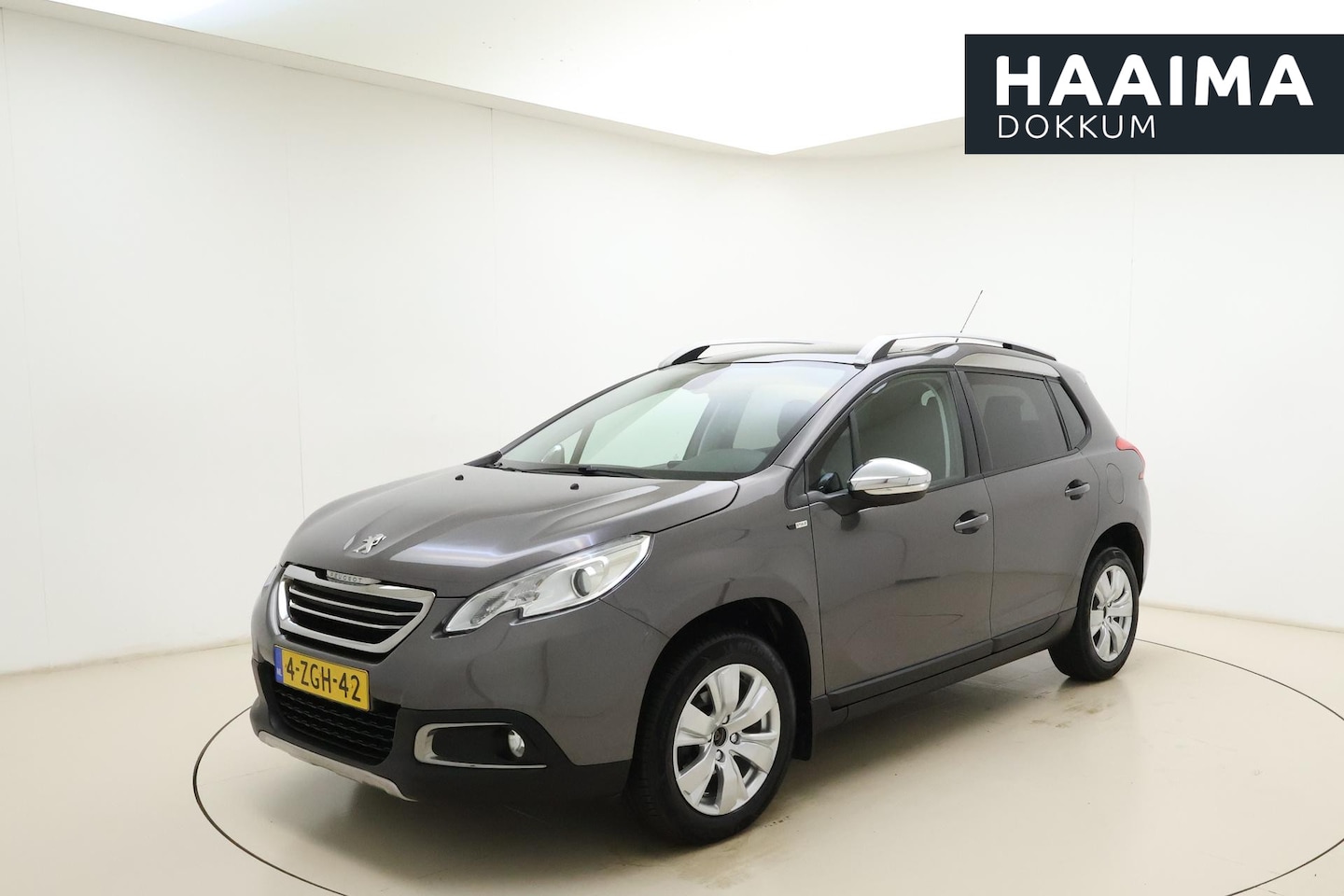Peugeot 2008 - 1.2 PureTech Style | Cruise control | Climate control | Panoramadak | Navigatie | Lichtmet - AutoWereld.nl