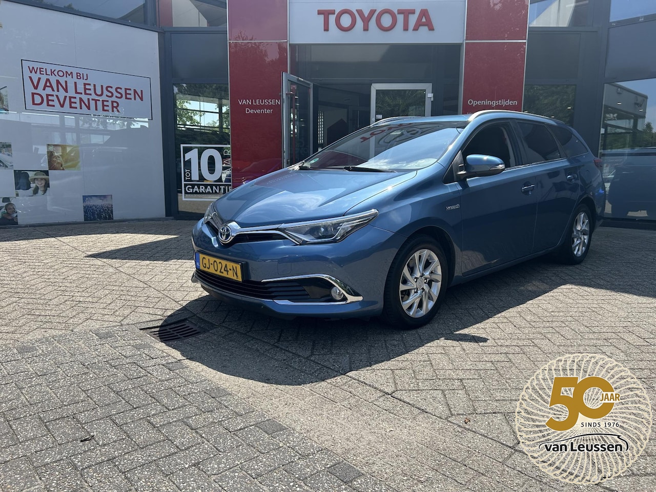 Toyota Auris Touring Sports - 1.8 Hybrid Lease Exclusive LEDER CRUISECONTROL - AutoWereld.nl