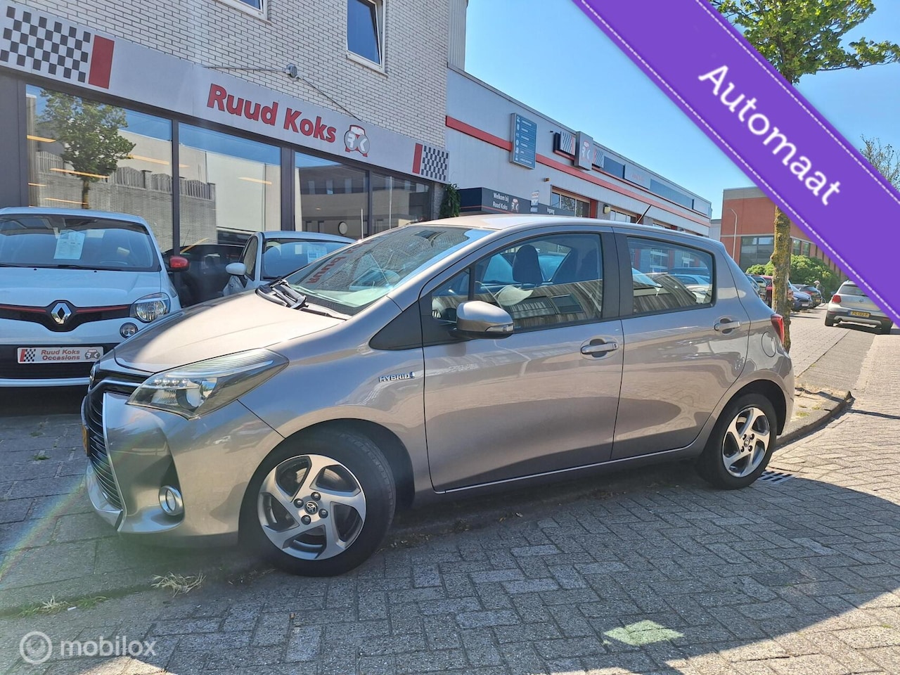 Toyota Yaris - 1.5 HYBRID LEASE • NAVIGATIE • CRUISE CONTROL • - AutoWereld.nl