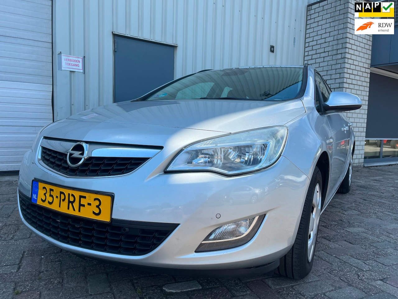 Opel Astra Sports Tourer - 1.4 Edition SCHADEAUTO! - AutoWereld.nl