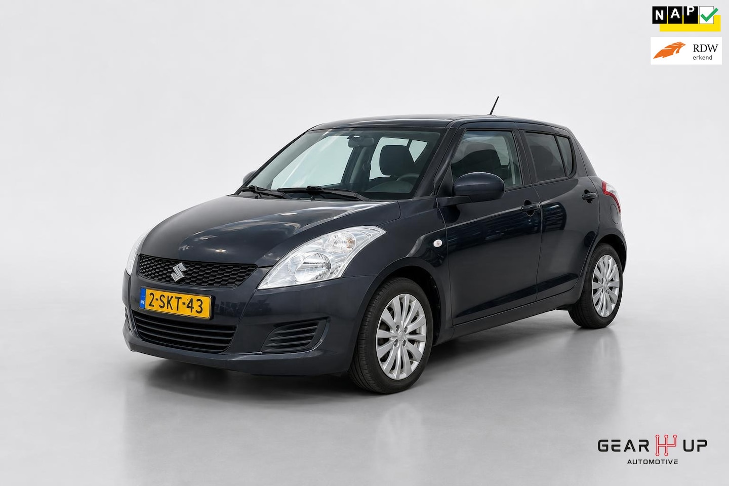 Suzuki Swift - 1.2 Bandit EASSS AIRCO|CRUISE|STOELVERW|LM|NAP| - AutoWereld.nl