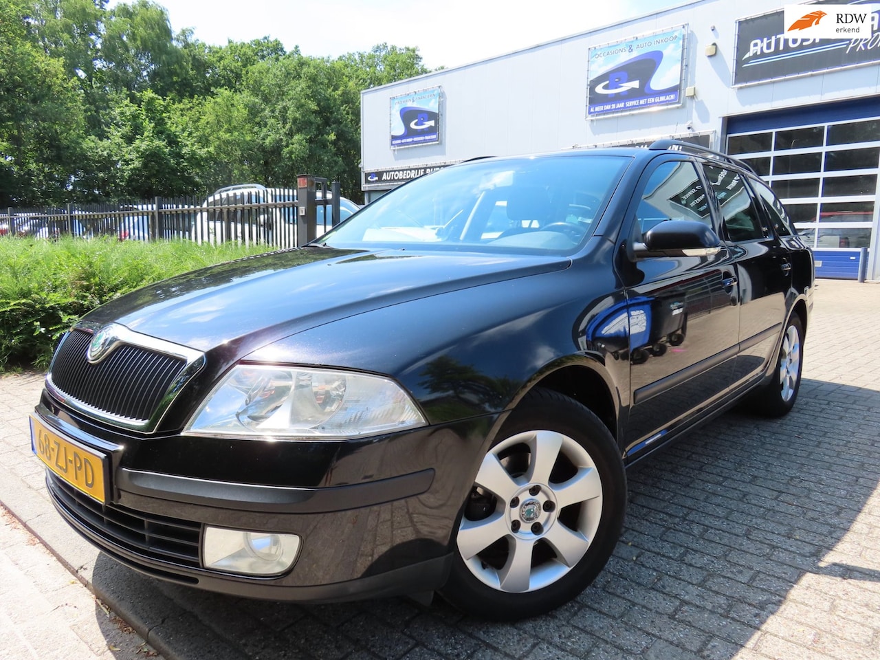 Skoda Octavia Combi - 1.6 FSI Ambiente Attractive Business 1.6 FSI Ambiente Attractive Business - AutoWereld.nl