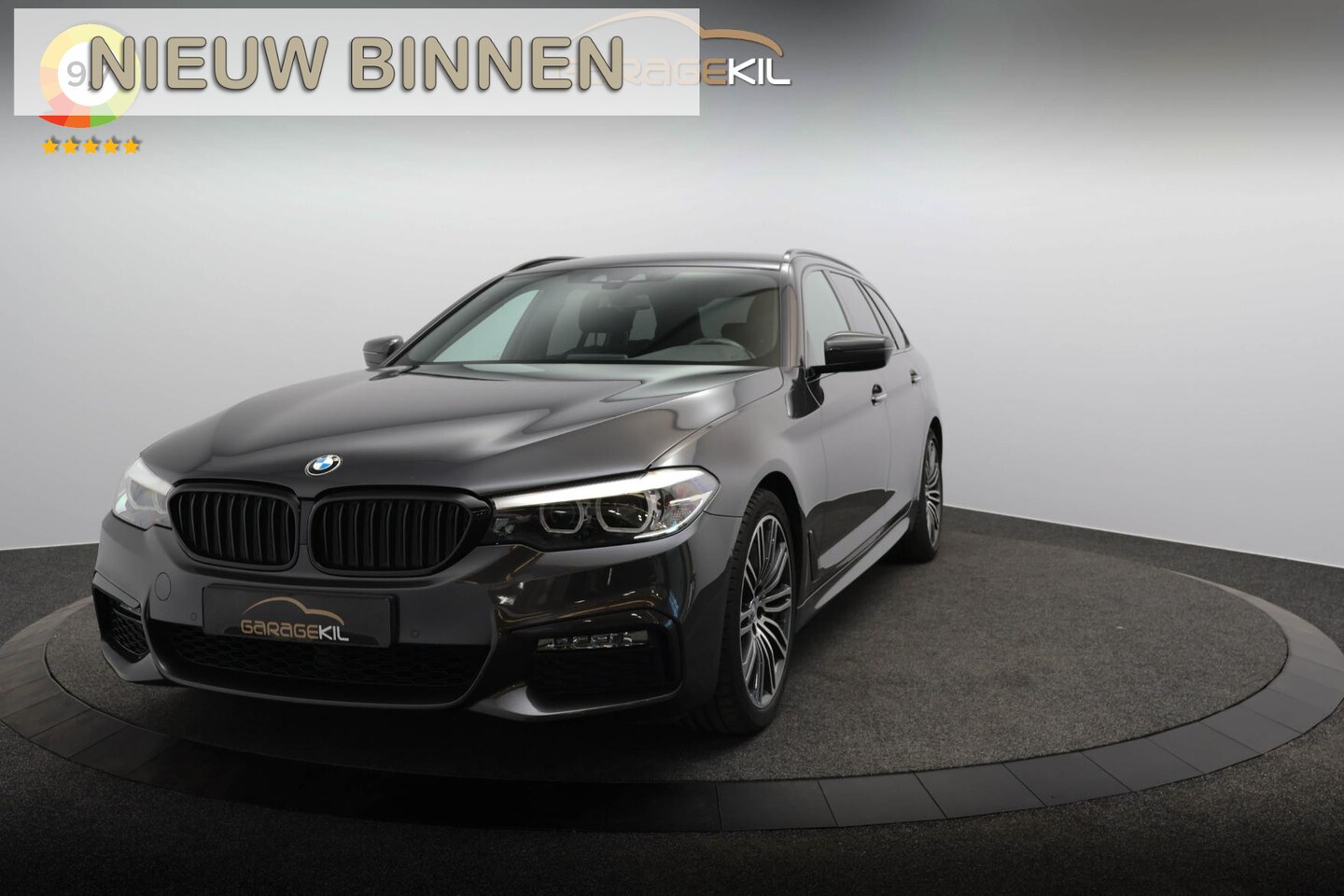 BMW 5-serie Touring - 520i High Executive M-Sport M-Sport / Sport onderstel / Camera / 19'' LM velgen / Alcantar - AutoWereld.nl