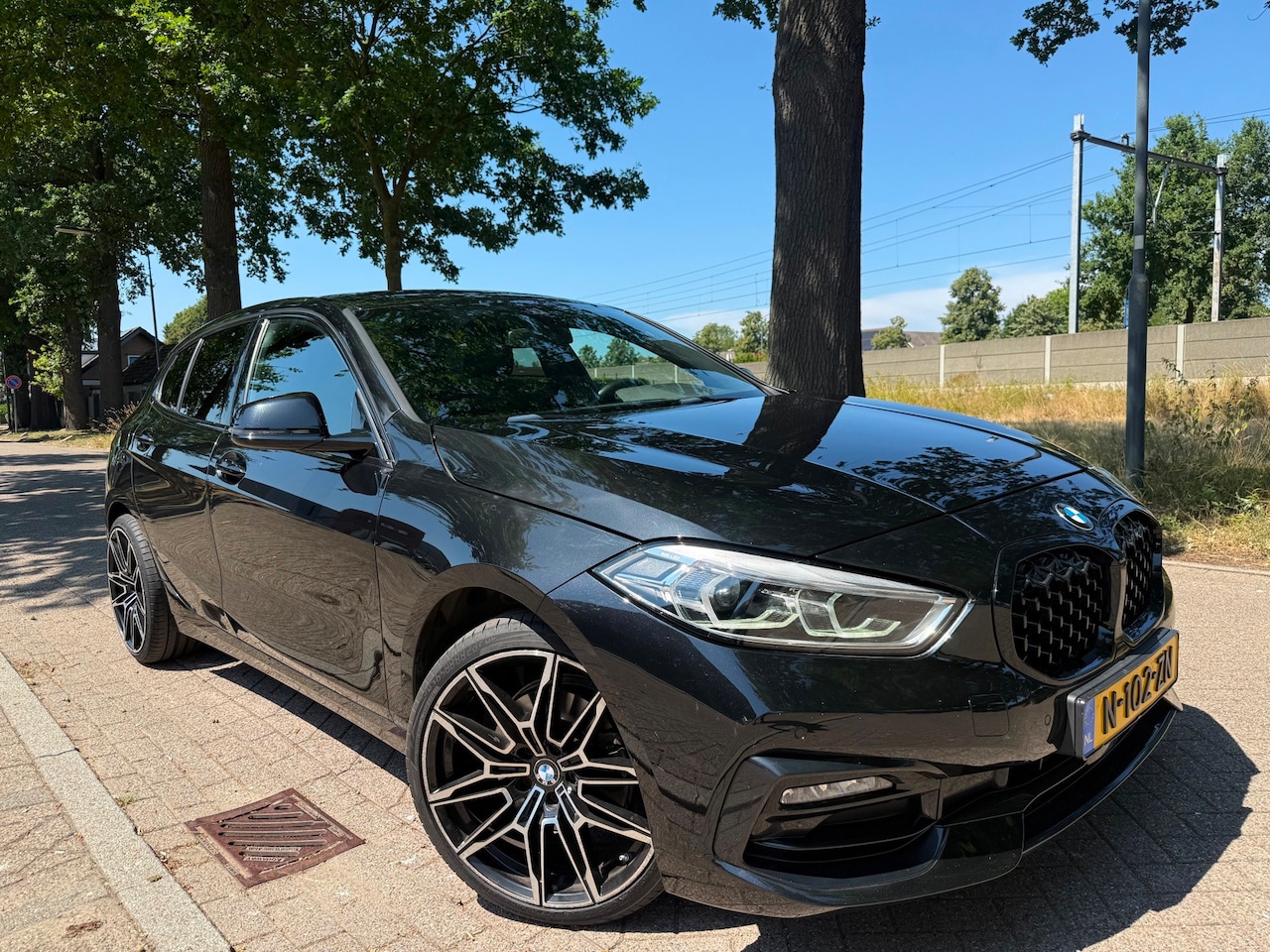 BMW 1-serie - 118i High Executive 2021 Xenon Led - AutoWereld.nl