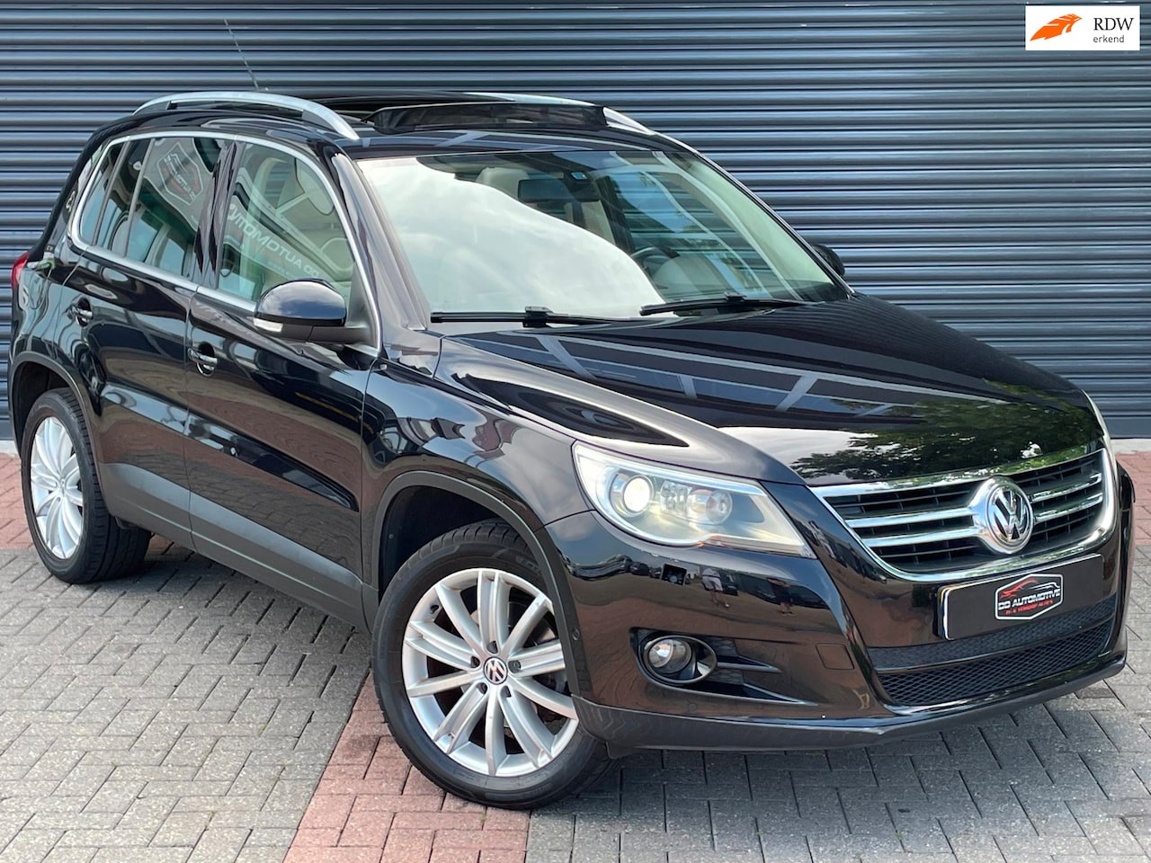 Volkswagen Tiguan - 2.0 TSI Sport&Style 4Motion Automaat | Pano | Leder | Navi | Xenon - AutoWereld.nl