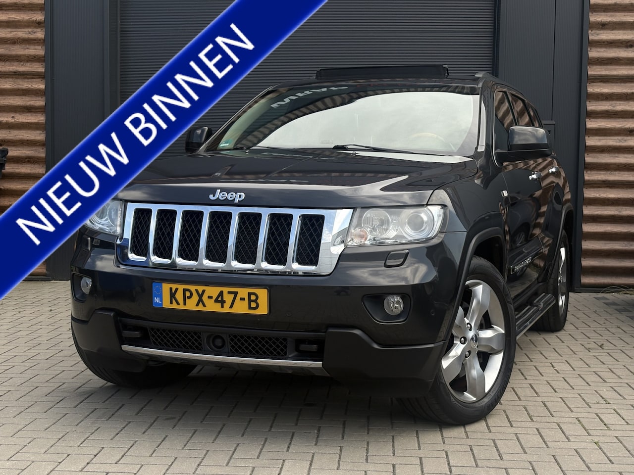 Jeep Grand Cherokee - 3.6 AWD Overland Airco ACC Cr-Control Panoramadak - AutoWereld.nl