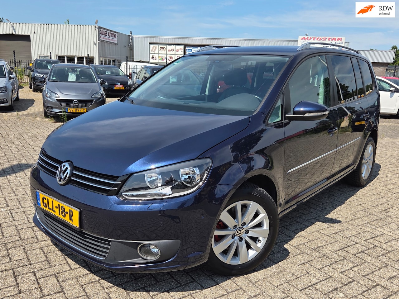 Volkswagen Touran - 1.4 TSI Highline 7p.AUTOMAAT/CAMERA/VOL OPTIES - AutoWereld.nl