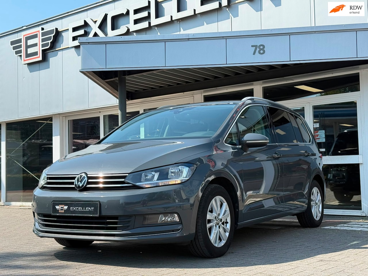 Volkswagen Touran - 1.5 TSI DSG Highline | Navigatie | 7 P - AutoWereld.nl