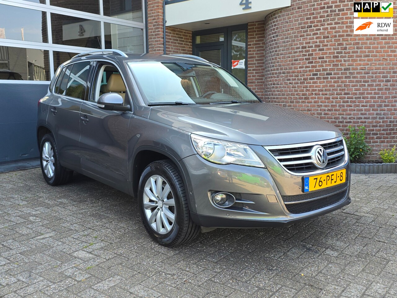 Volkswagen Tiguan - 1.4 TSI Sport&Style Apk |Nap |Cruise |Navi - AutoWereld.nl