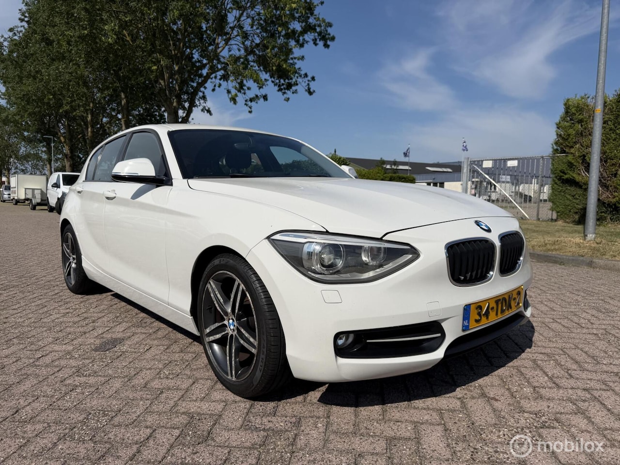 BMW 1-serie - 116i Business+ Eerste Eigenaar! - AutoWereld.nl