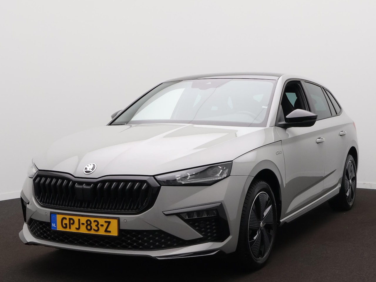 Skoda Scala - 1.0 TSI Monte Carlo | Panodak | Zwenkbare trekhaak | Camera | Elek. Kofferbakklep | Cruise - AutoWereld.nl