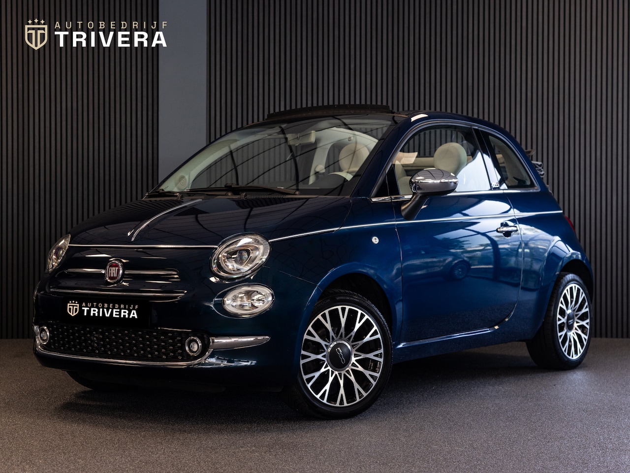 Fiat 500 - 1.2 Lounge cabrio l Parkeer Sensor l NAV l Dealer Onderh.l Zeer weinig km l ZO GOED ALS NI - AutoWereld.nl