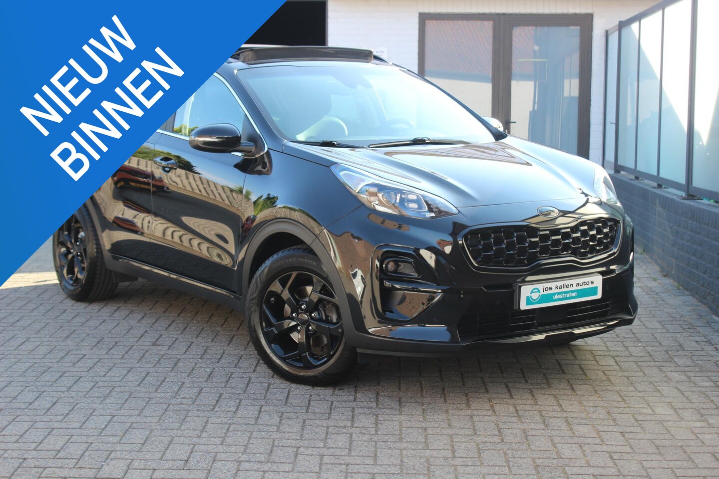 Kia Sportage - 1.6 T-GDI Black Edition Full Option|All Season|Trekhaak|Panoramadak|Camera - AutoWereld.nl
