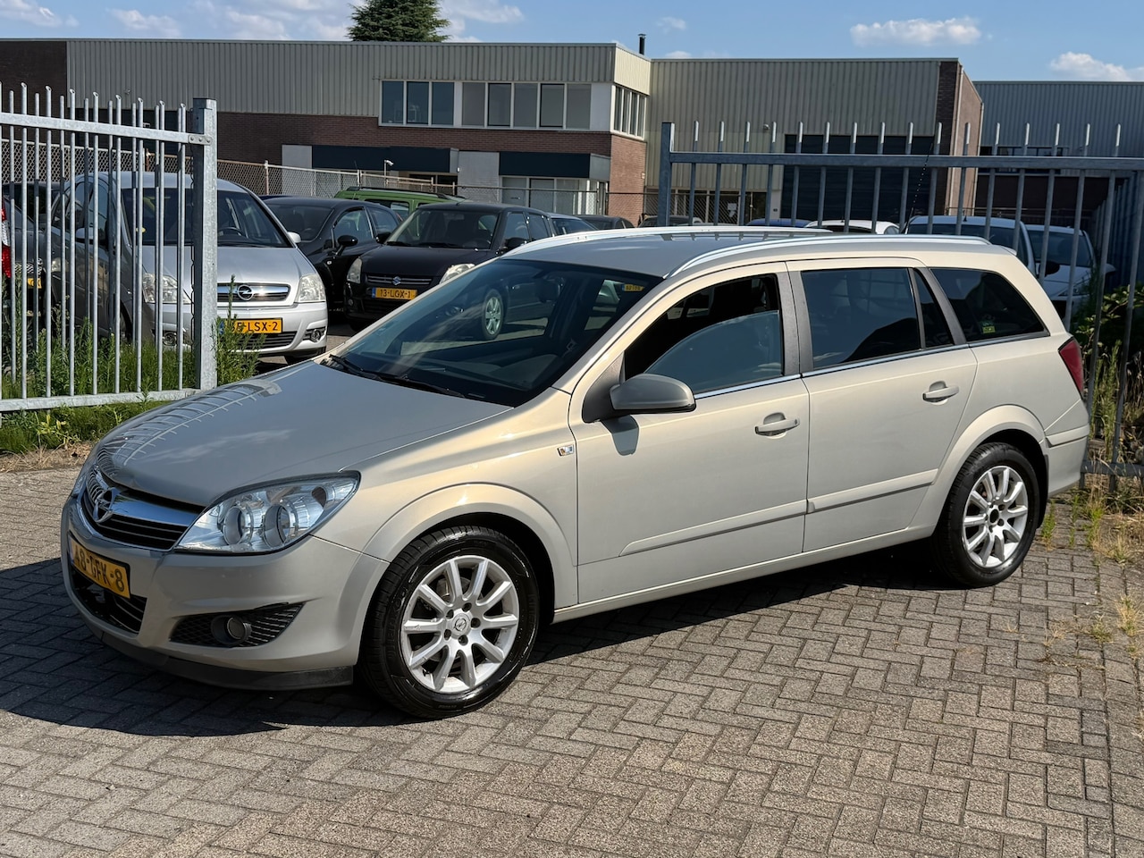 Opel Astra Wagon - 1.6 Temptation 116PK! 2e eigenaar! NL AUTO NAP! Airco l Cruise l Trekhaak l LMV l MTF-stuu - AutoWereld.nl