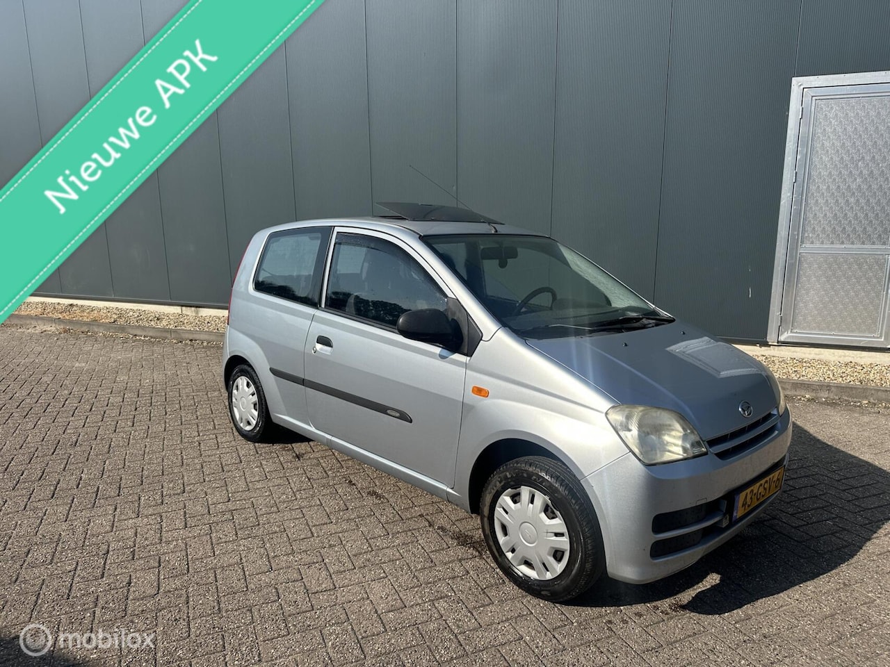 Daihatsu Cuore - 1.0-12V 100th Ann. Dakraam Nieuwe APK✅ - AutoWereld.nl