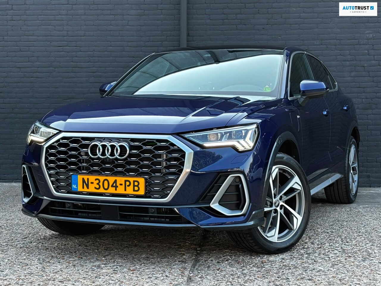 Audi Q3 Sportback - 45 TFSI e S Edition PANO | KEYLESS | NAVI | CAMERA | TREKHAAK | LEDER - AutoWereld.nl