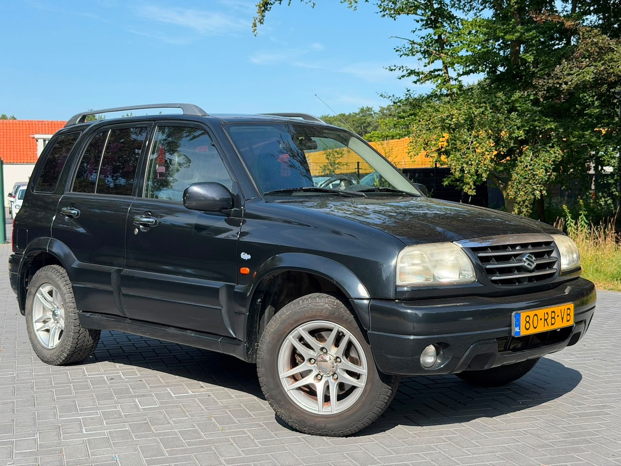 Suzuki Grand Vitara - 2.0 FreeStyle-3 4WD/Automaat/Airco/Leer/LMV/NAP - AutoWereld.nl