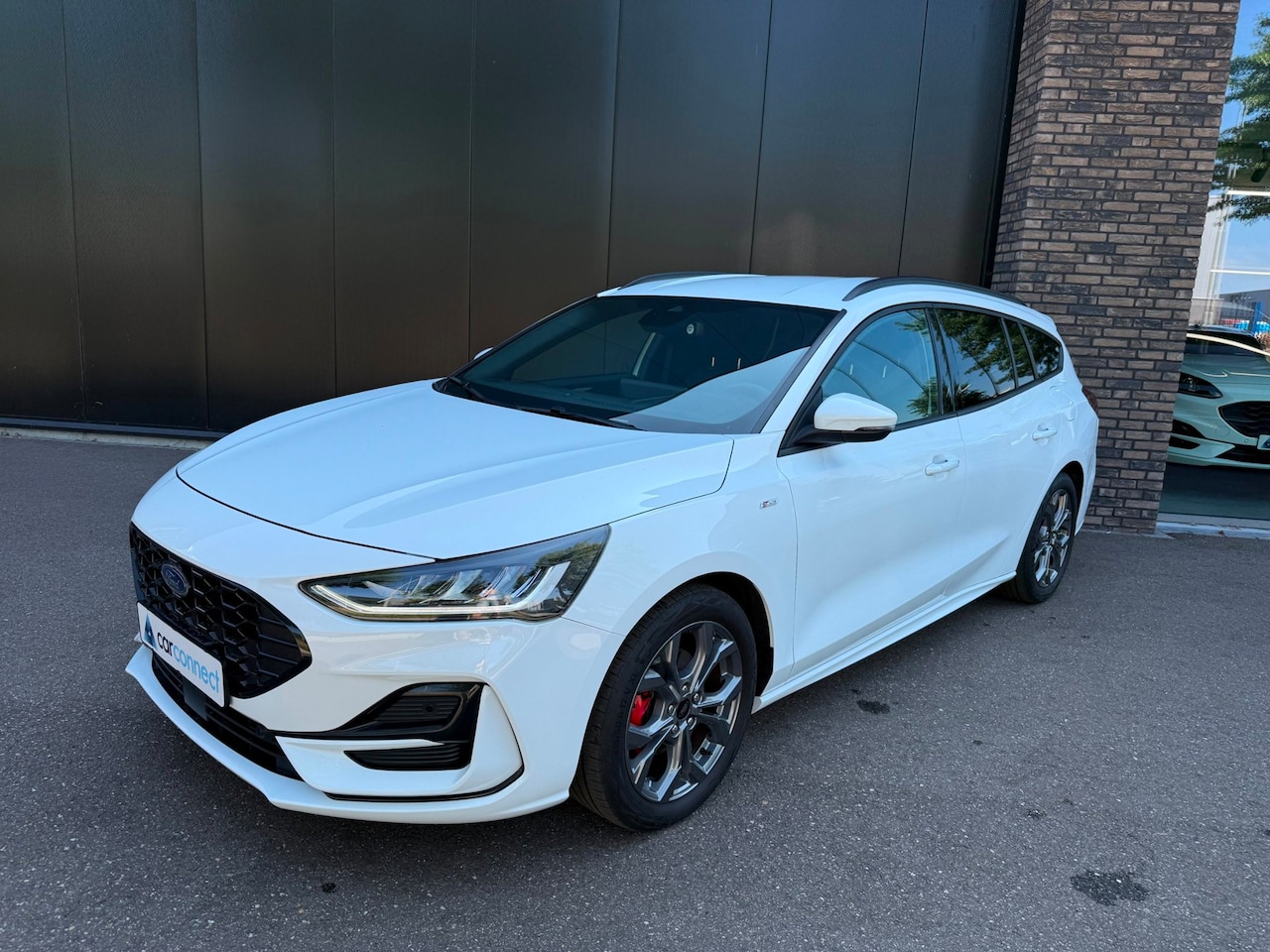 Ford Focus Wagon - 1.0 Eco 125pk Hybrid ST Line Navi, Adop. cruise, Winter, Spoiler groot etc. etc. - AutoWereld.nl