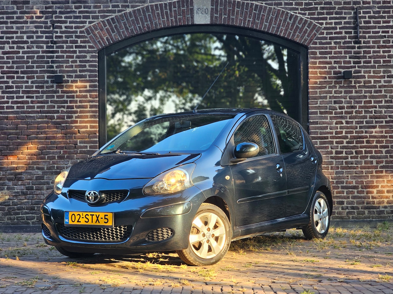 Toyota Aygo - 1.0-12V Aspiration Green Navigator | 122.000 km | Nav. | Lmv | Airco | Full Option | Org. NL - AutoWereld.nl