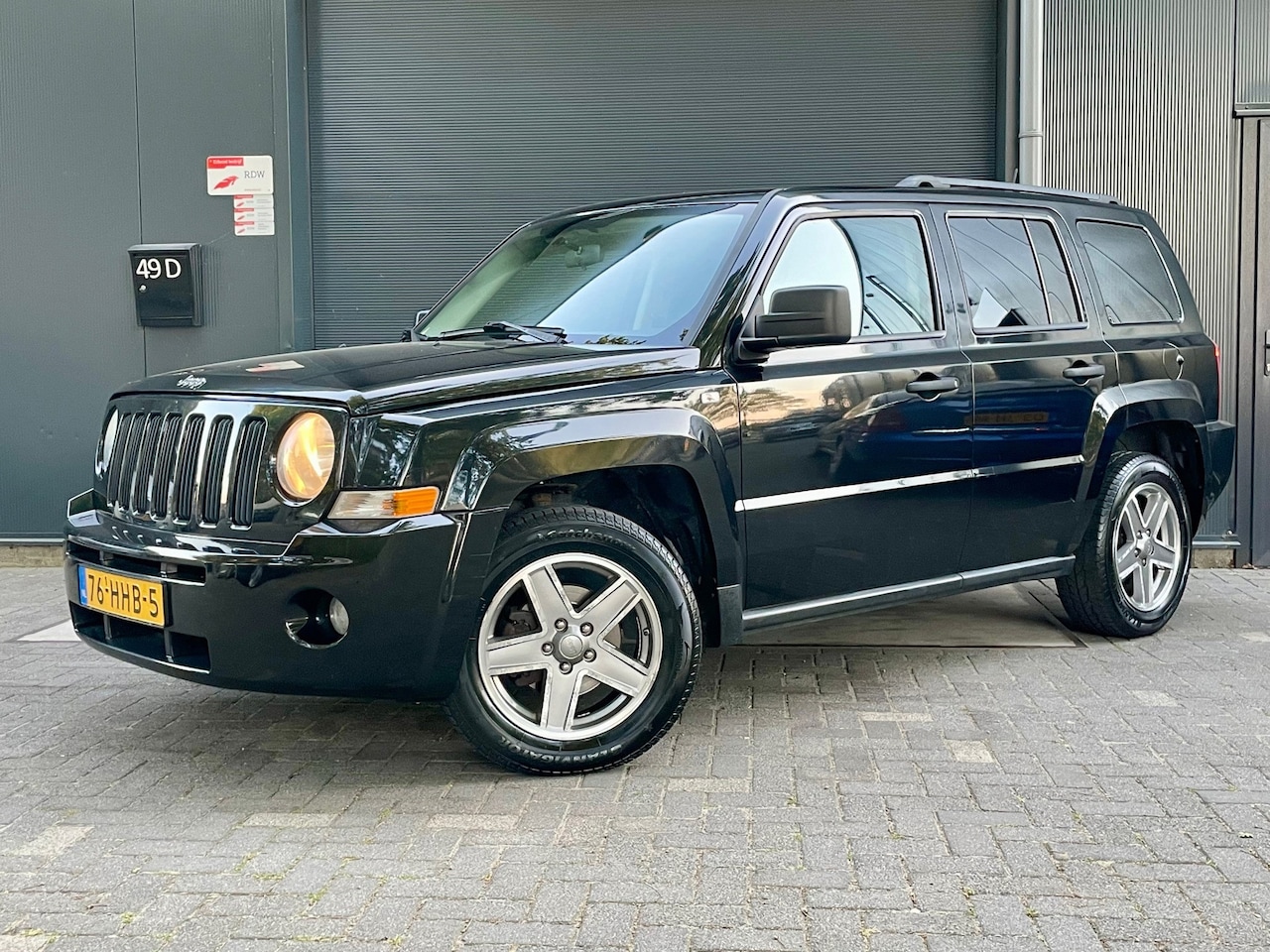 Jeep Patriot - 2.4 Sport Adventure INRUIL KOOPJE NAP AIRCO CRUISE BOSTON AUDIO - AutoWereld.nl